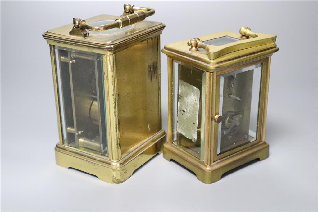 Two brass carriage timepieces, tallest 14cm with handle down